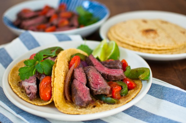 Steak Fajitas Recipe with Peppers, Onions, and Roasted Tomatoes